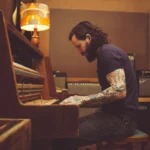 Blake Anthony Robson Leans Into Quiet Unease on Acoustic-Folk Single "It's Not Safe for Us"
